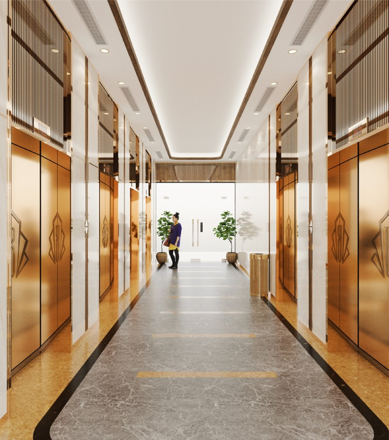 Sảnh tòa tại khu The Beverly với tường ốp đá hoa văn vàng đồng.